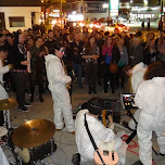 band playing in white suits during nuit blanche in Toronto, Canada 