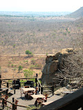 A view of one of the sitting/eating areas at the lodge with Masipa village (one of our neighboring villages) off in the background (just to the left of the hill far in the back). South Africa - 521.jpg