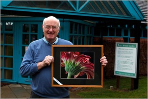 Don Bennett at Botanic Gardens 2011 with exhibition picture, Gerbera, by Tom Heslop