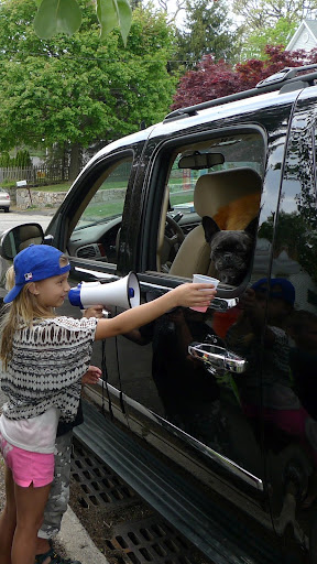 While riding with Uncle Carlos, we heard someone shouting through a megaphone and Carlos pulled over to see what all the commotion was about.