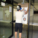 hanging up targets at the Niagara Gun Range in North Tonawanda, United States 