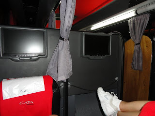 With a foot rest for a completely flat nap. And TV!