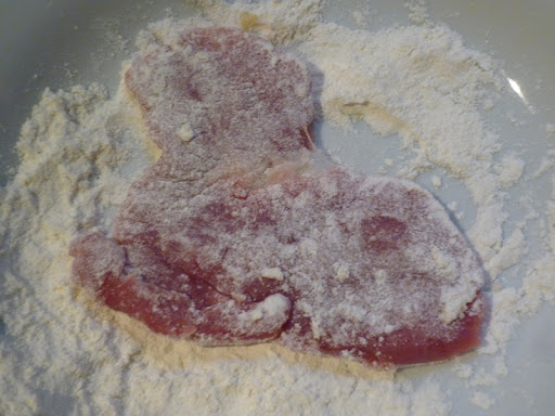 Dredge pork first in flour.