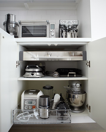 This pull out organizer by simplehuman makes it easy to access my small appliances without having to reach into the cabinet.
