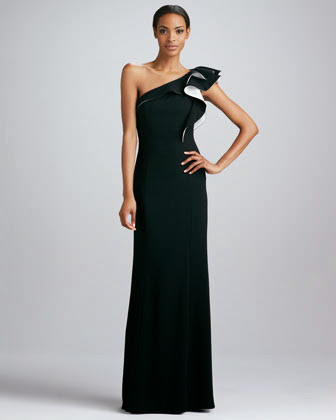 This Carmen Marc Valvo is far from basic black - dramatic details like its ruffled one shoulder transform this look into something aisleworthy. This Carmen Marc Valvo is far from basic black - dramatic details like its ruffled one shoulder transform this look into something aisleworthy.