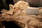 A calligraphed sign helped guests realize the gown's history. A calligraphed sign helped guests realize the gown's history.