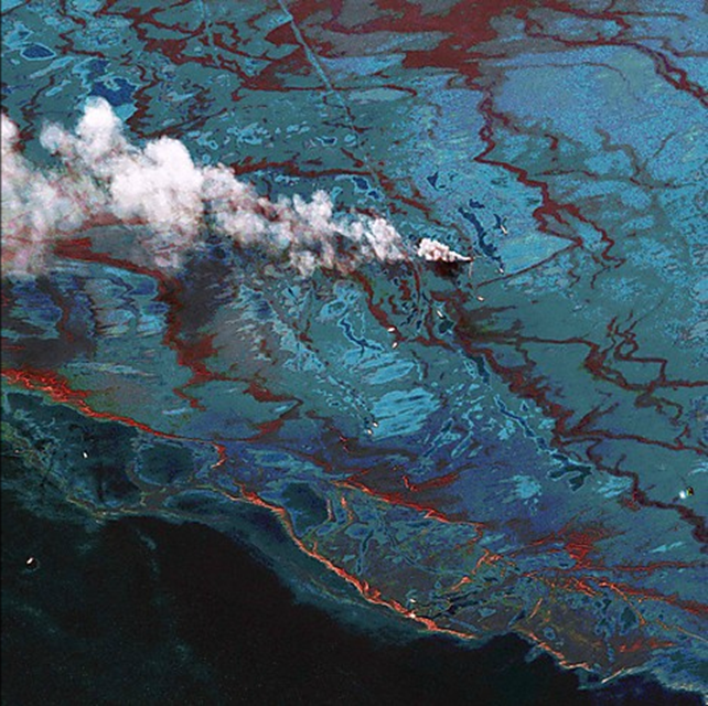A digitally enhanced satellite image shows the oil spill cleanup effort in the Gulf of Mexico. The image uses the satellite's sensor bands to highlight the oil and dispersant. DigitalGlobe via Reuters