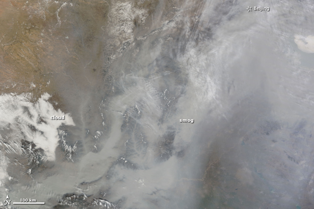 Dense smog settled over the North China Plain on 20 February 2011. The featureless gray-brown haze is so thick that the ground is not visible in parts of this photo-like image taken at 11:35 a.m. by NASA's Terra satellite. At that time, a weather station at Beijing’s airport reported visibility of 1.9 miles (3.1 kilometers). Visibility dropped as low as 1.1 miles (1.8 km) later in the afternoon. NASA image courtesy Jeff Schmaltz, MODIS Rapid Response Team at NASA GSFC