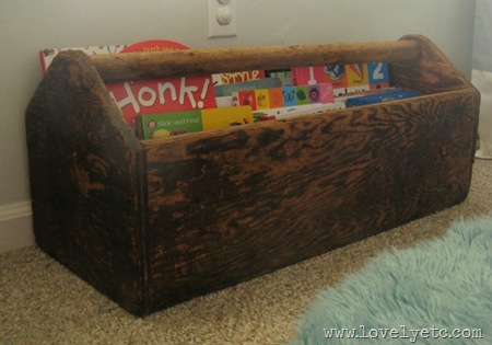 kids books in vintage toolbox