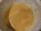 Vinegar, mustard seeds, and mustard powder get a soaking to soften the seeds.