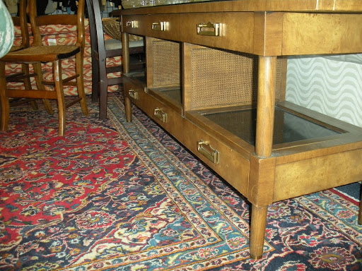 This console has great storage options, with many drawers and exposed shelves.