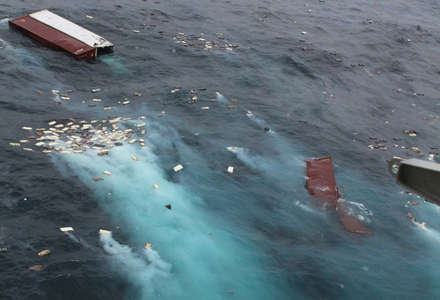 40 foot containers and liberated cargo float Off M/V Rena. Maritime New Zealand via cargolaw.com