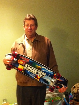 One of our family friends since our early childhood Mark Ingham with  Bruce's 36" Logan Earth Ski Gravity made board.