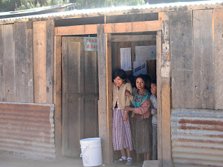 Aqua Viva school complex. the first school built by the Sienna Project is at left (not shown). The success of the school has attracted more students and now they need more rooms still. Photos by TOM HART