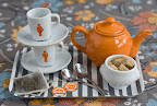The wedding weekend can be a hectic one. Stash this his-and-hers tea set in your room for some quiet time.