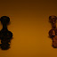 On the left is an original wax model, which is then wrapped in clay and fired. The wax melts, leaving a mould that gold is carefully poured in to. Finally, the clay mould is broken and discarded, leaving the golden creation on the right.