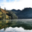 Morning mist clears from the lake at Ranukumbolo campsite