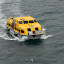 One of our shuttle boats. Theyre used for ferrying the passengers when the big ship cannot dock in the harbor.