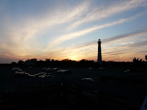 Sun setting behind the lighthouse