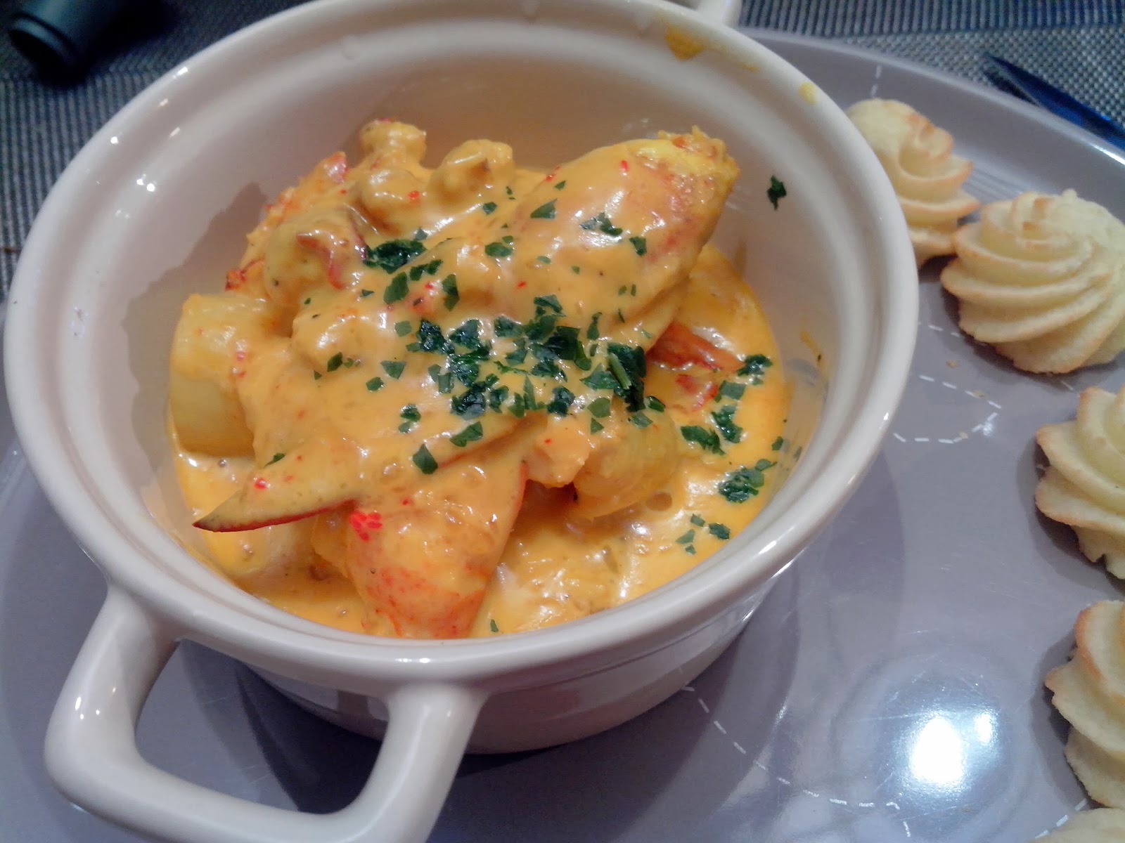 Cassolette de Homard et Saint Jacques crème safranée