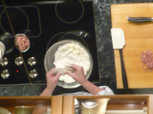 Instead of cutting in the butter, Nancy prefers to create little butter discs with her hands.