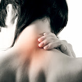 Woman holds a hand on pain neck. Isolated on white background
