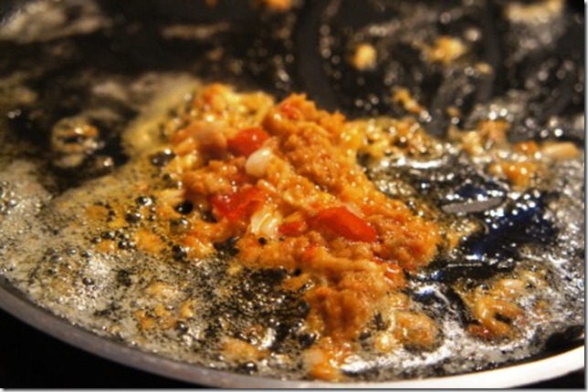 the garlic olive paste hits the butter            