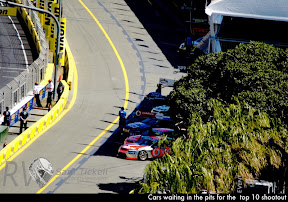 Cars waiting in the pits for the  top 10 shootout
