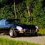 Jaguar E-Type V12 Coupe. 15x8 Wire-Wheels 205/70/15 and Headlight-Covers. Foto: Stefan Wahl Jaguar XK-E, with Head-Light-Cover Kit. The Head-Lamp-Cover Conversion Kit made by designer Stefan Wahl in the tradition of Malcolm Sayer. / Jaguar E-Type mit Scheinwerferabdeckungen, designed und hergestellt von Designer Stefan Wahl in der Tradition von Malcolm Sayer.