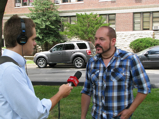 KSMU's Sam Crowe interviewing Drury's Visiting Assistant Professor of History, Dr. Monty Dobson.
(Photo credit: Jeremy Shreckhise)