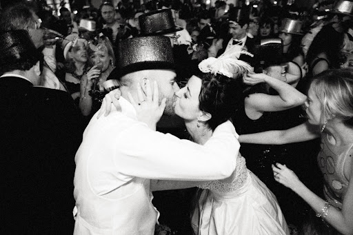 At the same time, I changed into a mini-hat by Twigs & Honey, and Jamie put on a top hat. I think this photo was taken a few seconds after midnight. We're the only ones still kissing! At the same time, I changed into a mini-hat by Twigs & Honey, and Jamie put on a top hat. I think this photo was taken a few seconds after midnight. We're the only ones still kissing!