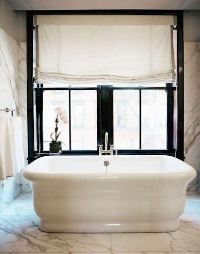 The mix of texture, shape and material really work well together in this bathroom. (decorpad.com)