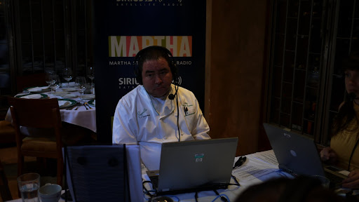 Minutes before the show begins, Chef Emeril waits for his cue.