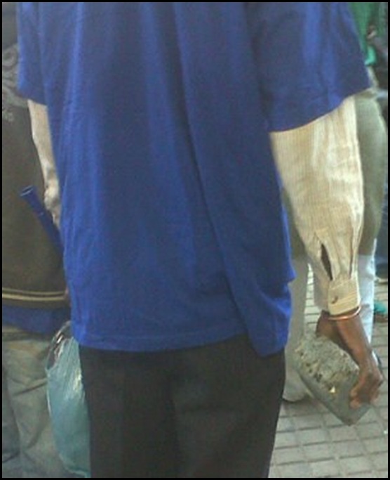 DEMOCRATIC ALLIANCE PROTESTOR ARMED WITH BRICK MAY 15 2012 MARCH TO COSATU HOUSE JOHANNSBURG PIC BY ka_GWATA