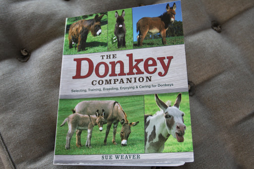 It's the book we got at the Tractor Supply Store - The Donkey Companion.  I thought maybe we could gain a little insight on our donkey pals, Rufus, Billie, and Clive!