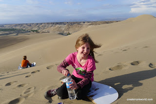 Emma loves the sandboarding in the Nazca desert.