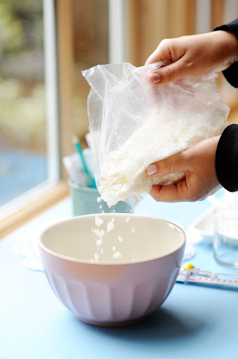 Step 1: Place the soy wax into the double boiler. If you don't have a double boiler, place a heat-safe bowl over a pot of boiling water. Step 1: Place the soy wax into the double boiler. If you don't have a double boiler, place a heat-safe bowl over a pot of boiling water.