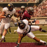 Montana's Dan Moore powers into the endzone early in the 2nd quarter, trucking his way past NAU's Lucky Dozier to make the score 24-7.  Washington-Grizzly Stadium in Missoula, MT, Sept. 22nd, 2012.