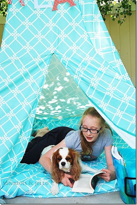 hannah and trixie in the reading teepee