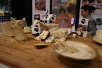 These unique goat and sheep milk cheeses from family-run Fromagerie Ottavi of Corsica are worth seeking out for their tangy, fresh, herbal flavors.  (Those are Corsican flags flying!)