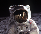 c0 Buzz Aldrin, Apollo 11; Neil Armstrong can be seen his visor.