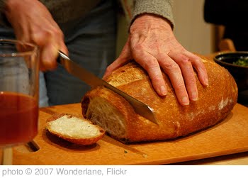 'Breaking bread, juice, dinner party, Broadview townhouse, Seattle, Washington, USA' photo (c) 2007, Wonderlane - license: http://creativecommons.org/licenses/by/2.0/