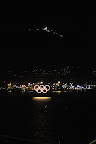 Olympic rings on Vnacouver harbour with Cypress Mountain in the background