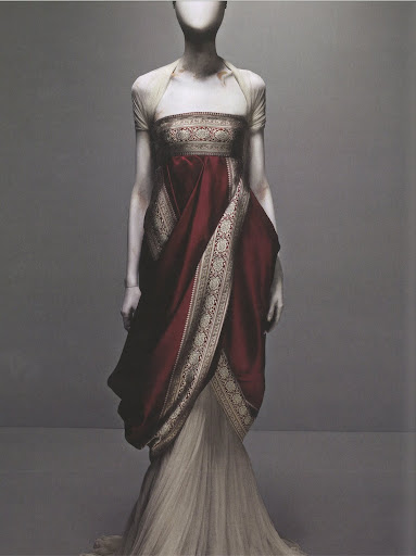 While working, McQueen liked to recall the styles and personas of great women of the past–Catherine the Great and Marie Antoinette, for example. This dress embodies the power and elegance of those iconic figures. 