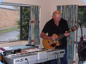 Kevin Johnston playing guitar and accompanied by a backing arrangement on the Korg Pa1X. Whilst Kevin played we all enjoyed a sumptuous lunch including freshly caught snapper both crumbed and smoked and courtesy of Kevin Johnston the fisherman!