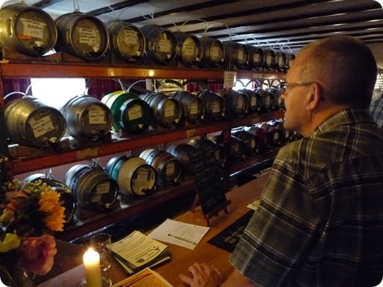 A visitor views the cask ales inside The Globe Pub