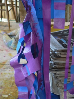 Tape aids the process of Booth's work.