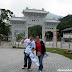 Hubby and Wifey gamely posing in front of a picturesque view of Ngong Ping's arch entrance
