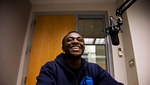 Michel Chikwanine , a former child soldier, tells KSMU's Jennifer Moore his life story. Photo Credit: Alex Crowder