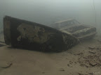 Estate car: with sunked boat